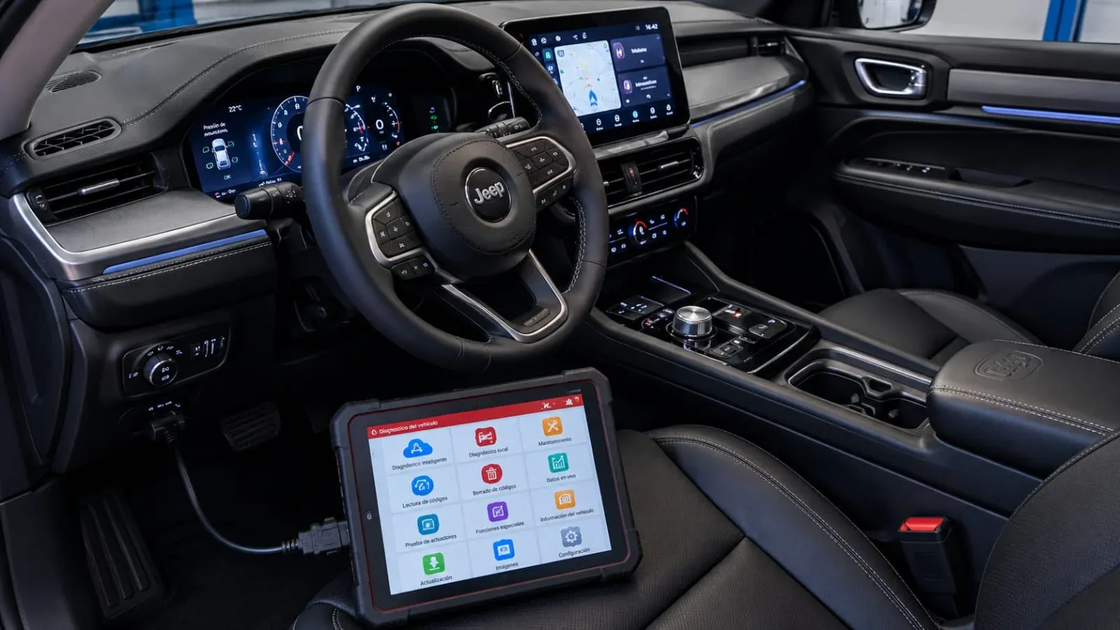 Escáner de diagnóstico conectado al auto, apoyado sobre el asiento